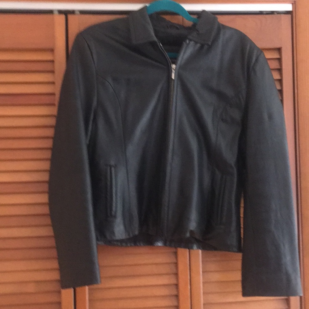 Woman’s black leather jacket